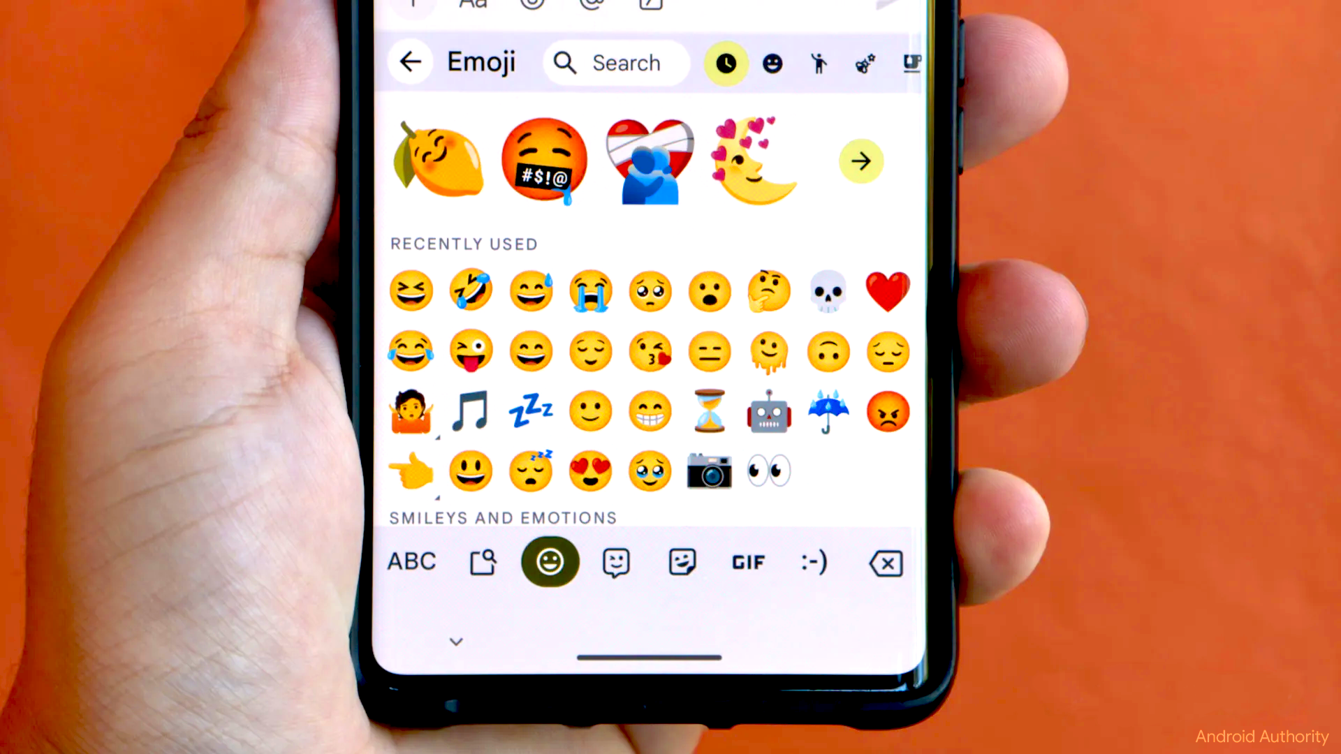 Gboard's emoji keyboard with Emoji Kitchen suggestions, photographed by Android Authority.