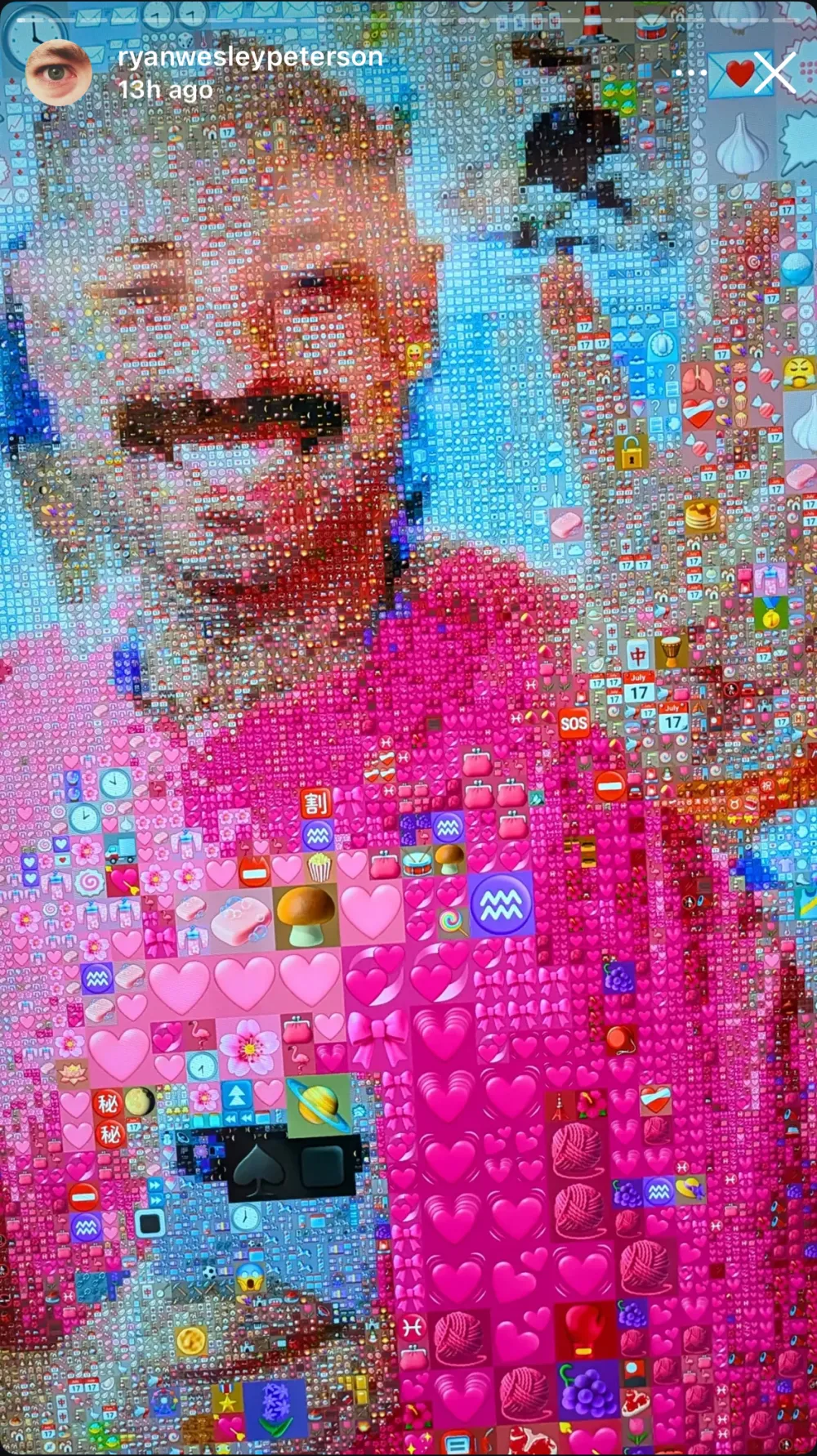 Ryan Wesley Peterson in the mirror, his pink shirt resolving into a field of pink hearts