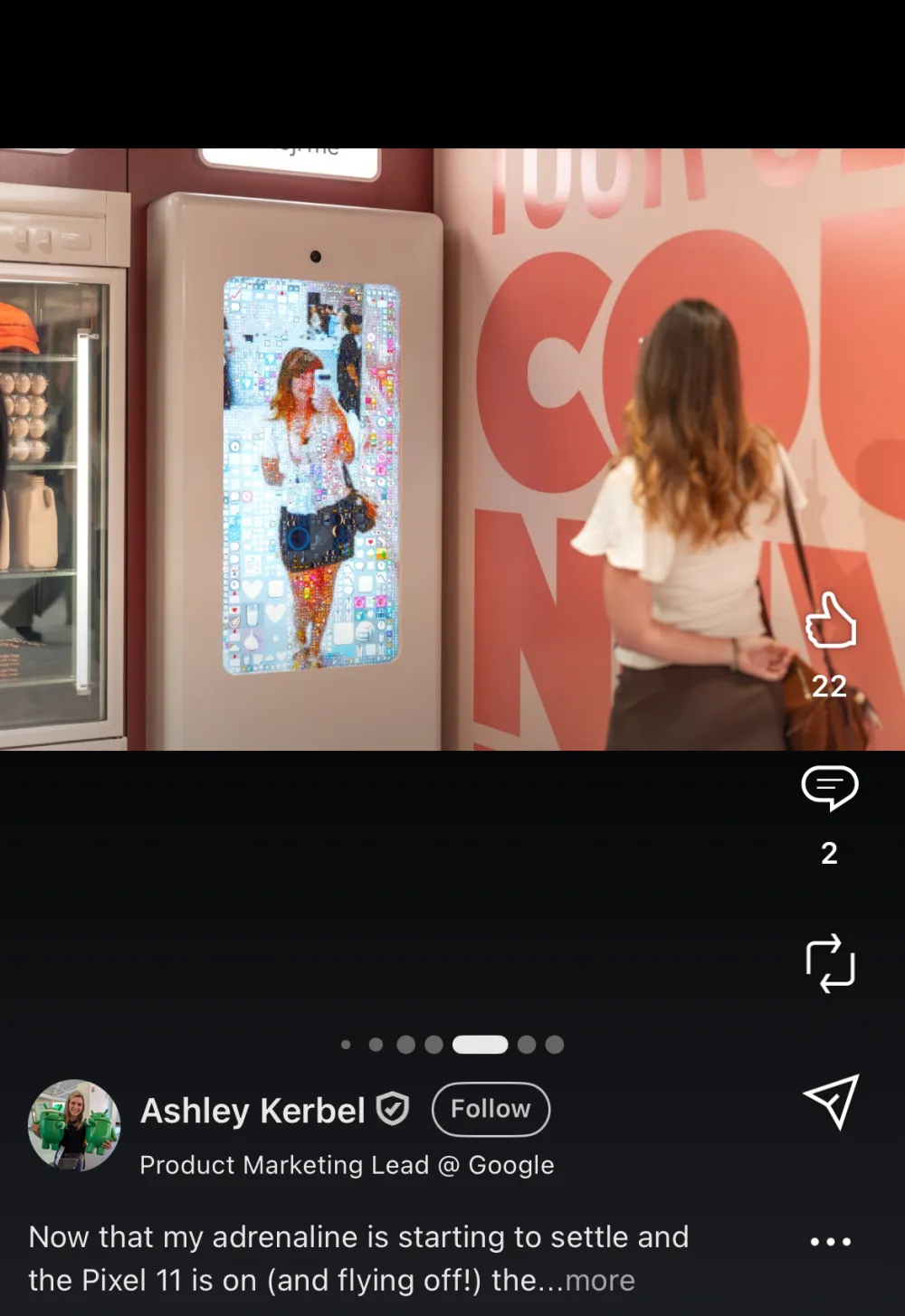A guest watching herself resolve into emoji, seen from behind
